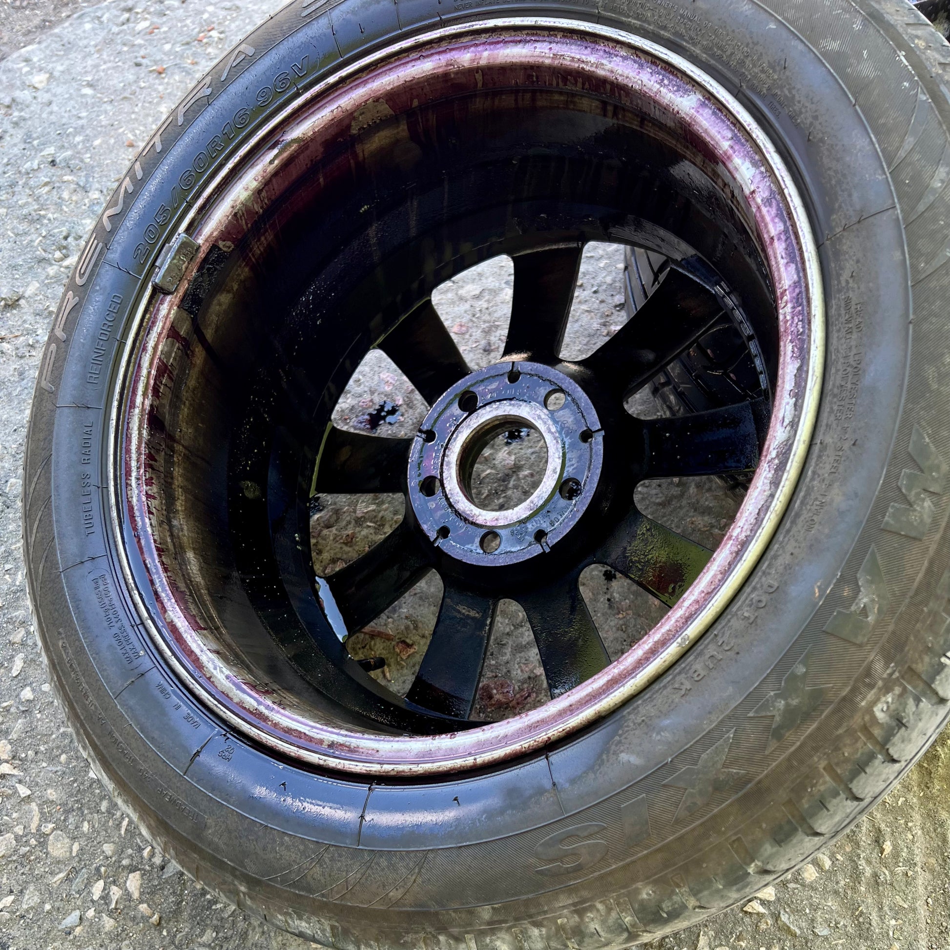 wheel sprayed with snake skin iron cleaner